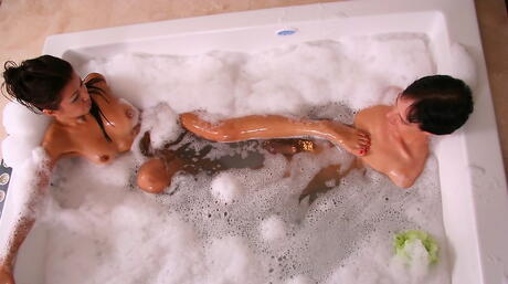 Appealing asian milf Jackie Lin take in mouth cock in bath