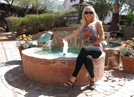 Enchanting american wife Sandra Otterson in glasses baring big knockers and spreading her legs outdoor