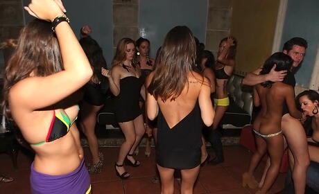 Very attractive women Mia Gold and Nikki Blake enjoy hardcore group sex in the club