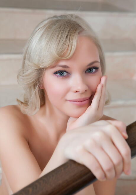 Luscious blonde youthful Feeona A shows tiny tits and bald pussy 