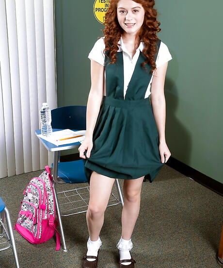 Foxy american redheaded youthful Alice Green reveals her butt in uniform and masturbating 