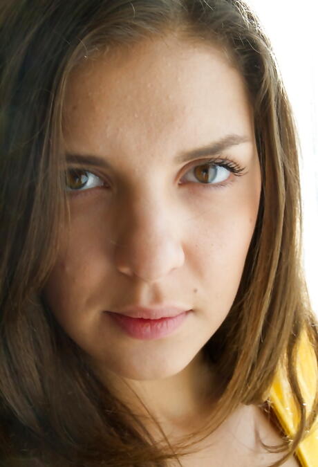 Lovely russian brunette Henessy in sexy panties reveals big boobies and sexy ass 