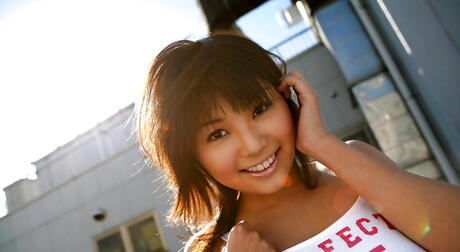 Excellent japanese hottie Azumi Harusaki in fancy shorts exposing her butt outside