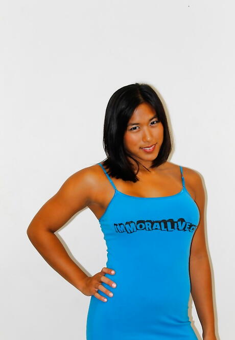 Delightful asian dark hair cutie Mai Li in nice skirt showing big titties and ass 