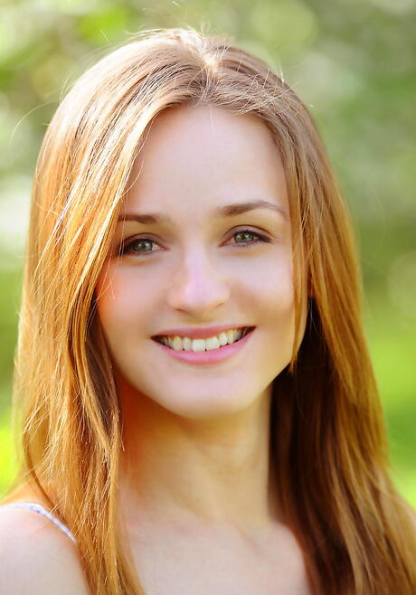 Shapely teen Vittoria Amada revealing big titties and shaved pussy outdoor