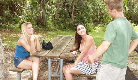 Superb girls Robyn Lee and Carmella Diamond enjoy amazing threesome scene outdoor