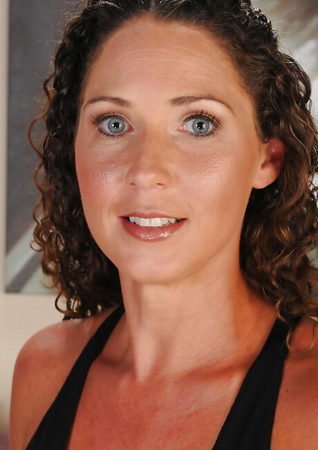 Slim milf Carmen exposing small tits and cute pussy 