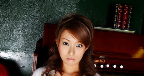 Very attractive japanese hottie Nao Yoshizaki in sexy skirt exhibits her ass and hairy pussy 