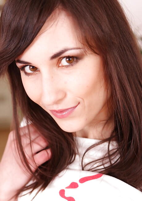 Foxy milf Jennifer Green in fancy skirt exhibits tiny tits and masturbates 