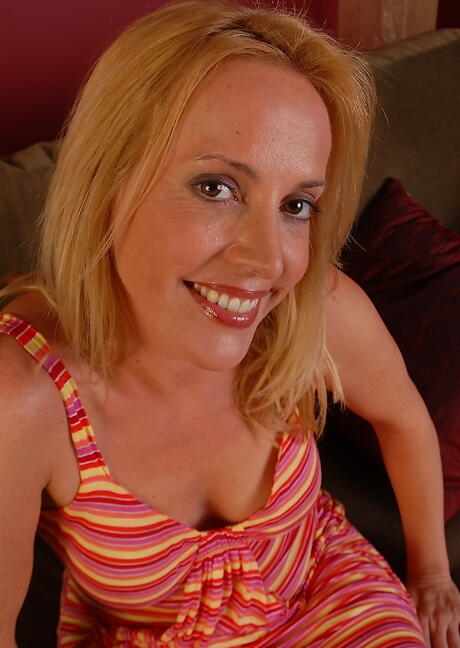 Peachy blond milf Katrina in sexy undies showing big knockers and hot butt 