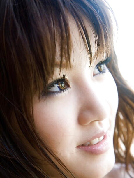 Delightful japanese babe Mari Misaki showing big boobs and hairy pussy on the beach