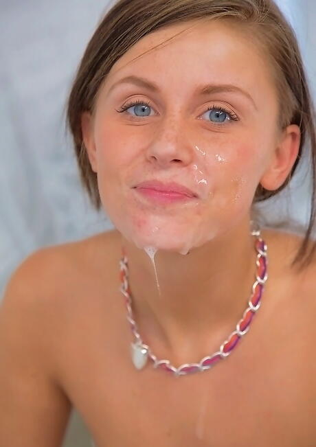 Sylphlike american teen Whitney Westgate sucking deep on huge cock and gets a cum shot on her face in bathroom