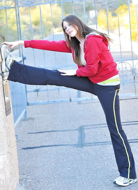 Svelte american hottie Shae Snow denudes tiny tits and ass outside