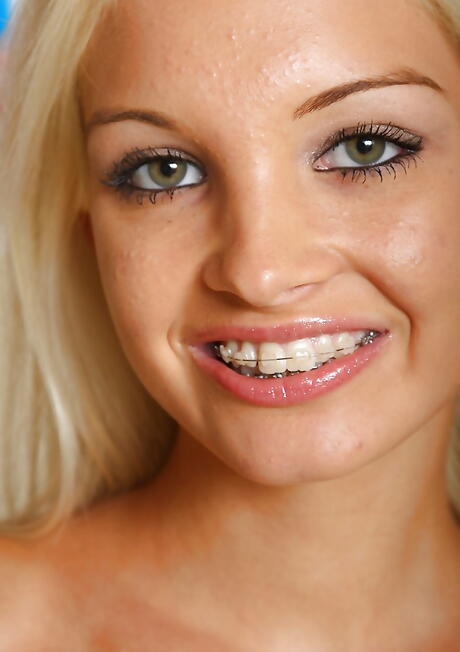 Foxy blond teen Franziska in undies exposing small tits and shaved pussy 