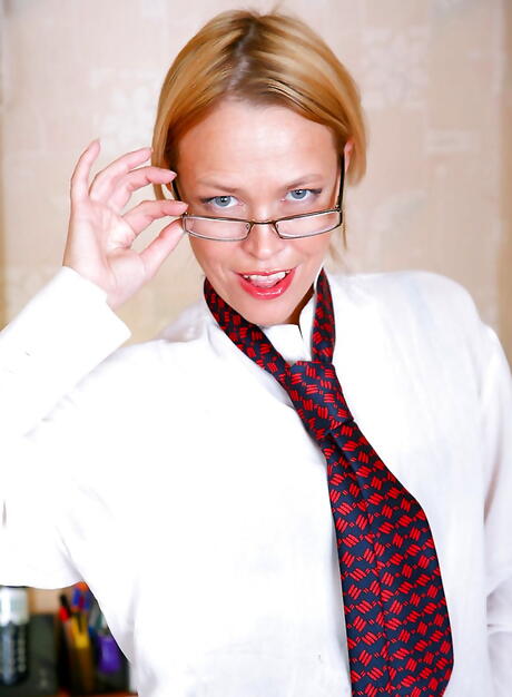 Very attractive milf Olga in lingerie exposing tiny tits and nice pussy in office