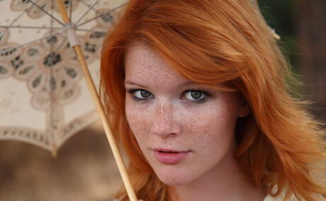 Svelte czech redhead teen Mia Sollis showing big hooters and spreading her legs outdoor