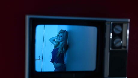 Attractive american blond Corinna Blake reveals big knockers and sexy ass 