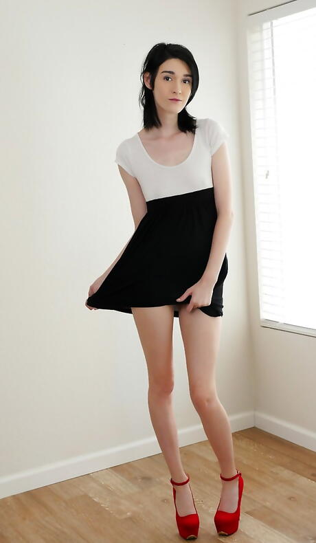 Sylphlike american brunette youthful Ivy Aura in sexy skirt denudes small tits and masturbates 