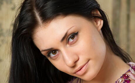 Appealing dark hair cutie Marina H exposing big hooters and shaved pussy 