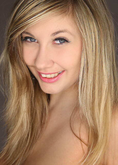 Stunning blonde youthful Holly Anderson shows big boobs and spreads her legs 