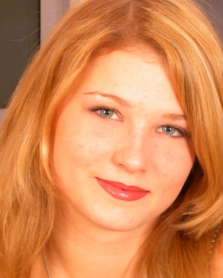 Very attractive young Katia in hot undies bares her ass and spreads her legs 