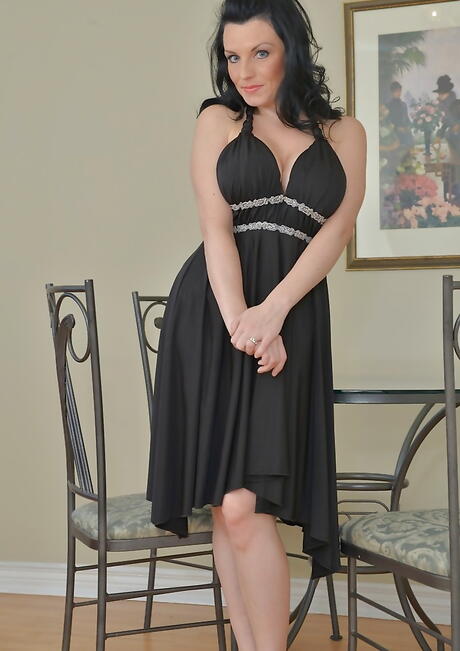 Glamorous canadian brunette mature Stacy Ray revealing big tits and bald pussy 