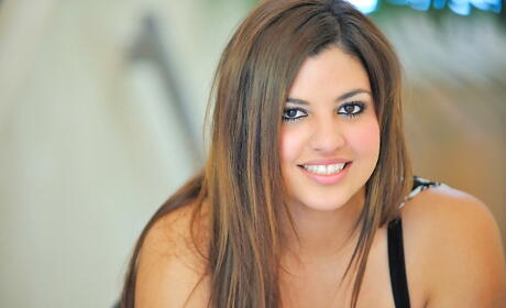 Seductive brunette hottie Daphne in fancy skirt bares big boobs and loves sex toy 