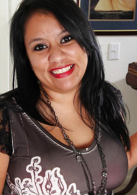 Stunning latin milf Lucey Perez in undies showing big hooters and spreading her legs 