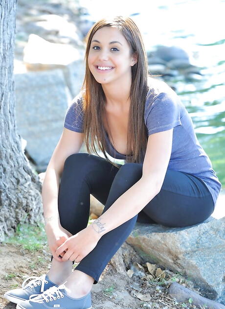 Sylphlike american teen Sabrina Taylor in shorts reveals big boobs and plays with toy outdoor