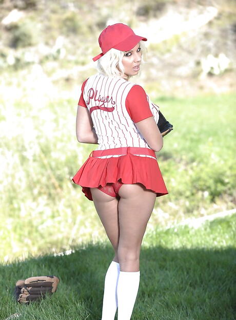 Tempting american babe Lylith Lavey revealing big boobs and spreading her legs outdoor