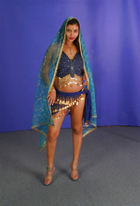 Gracile indian hottie Vishna baring small tits and bald pussy 