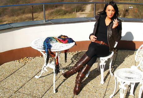 Slender teen Monika denudes big boobs and spreads her legs outdoor