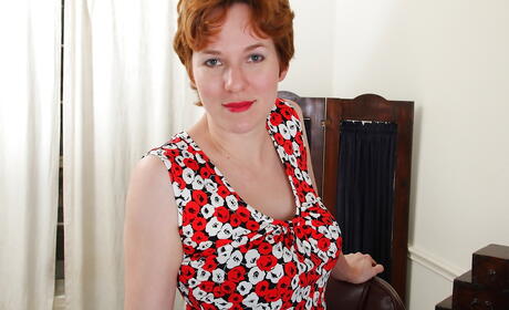 Enchanting aged Clarissa exhibits big knockers and spreads her legs 