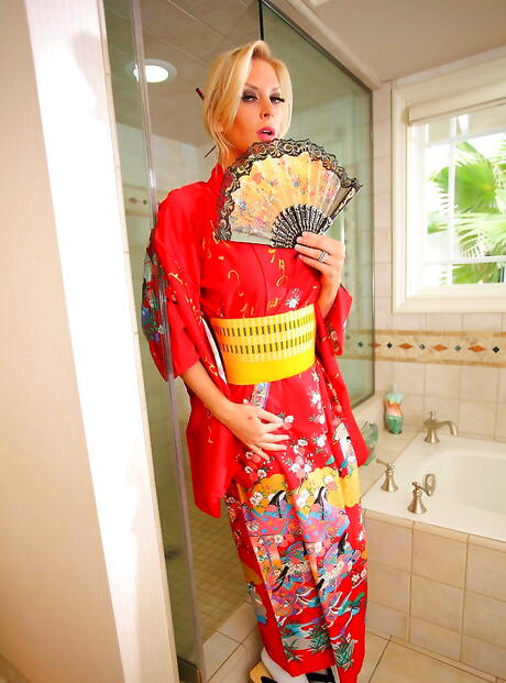 Delightful american milf Brooke Banner in lingerie exhibiting big titties and jerking off in the bathroom