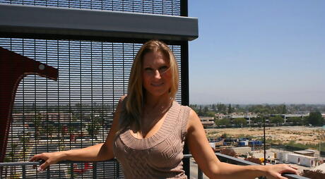 Enticing american milf Devon Lee sucks on big black rod and takes a cum shot in her mouth outside