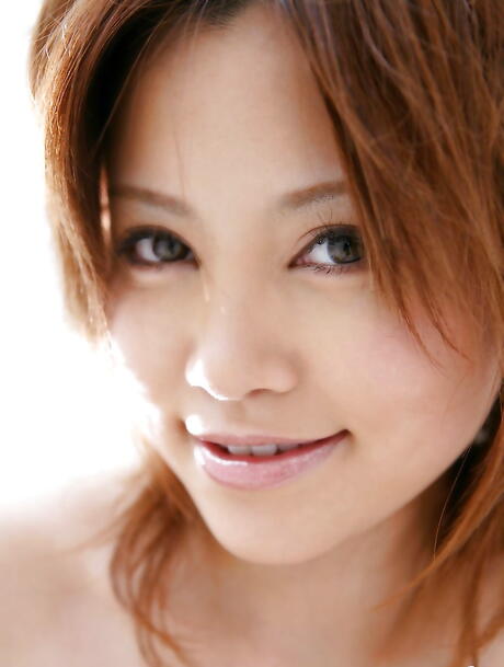 Very attractive japanese teen Hitomi Yoshino in sexy shorts revealing her ass 