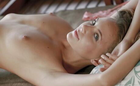 Excellent blond hottie Clover baring small tits and masturbating outside