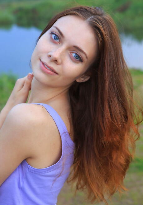 Gracile redheaded teen Kei A makes some foot fetish action outdoor