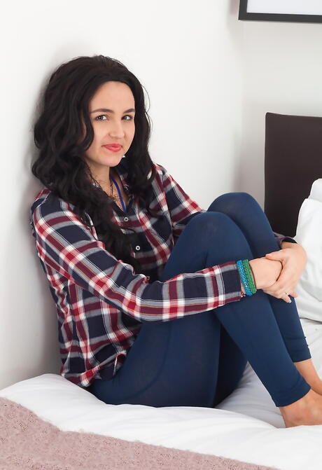 Svelte dark hair babe Sophie Smith exposing tiny tits and spreading her legs 