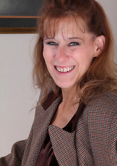 Very attractive mature Alley showing small tits and hairy pussy 