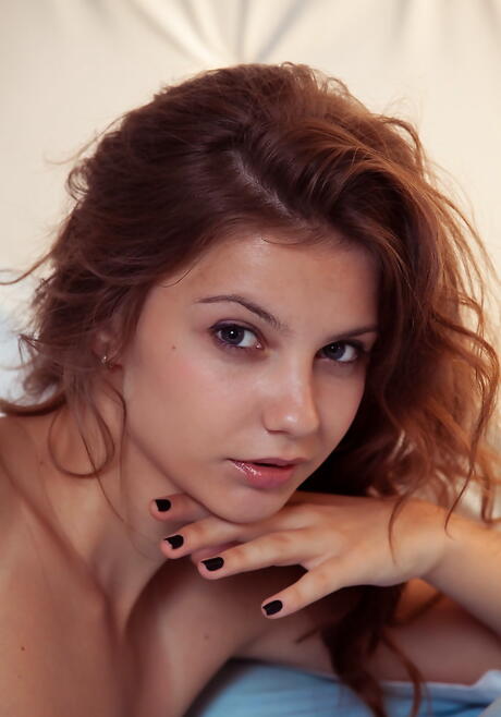 Slim ukrainian youthful Emma Sweet in hot panties exhibits small tits and spreads her legs 