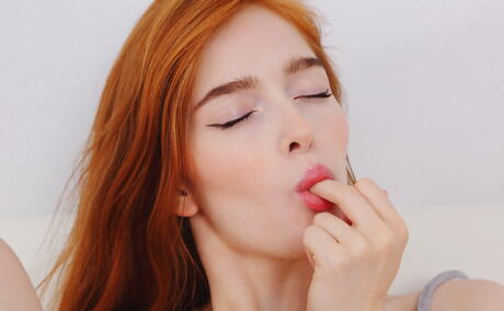 Sexy redheaded teen Jia Lissa exposes small tits and masturbates 