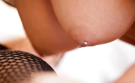 Curious women Amber Cox and Natalie Heart licking pink pussies during hot lesbian sex 