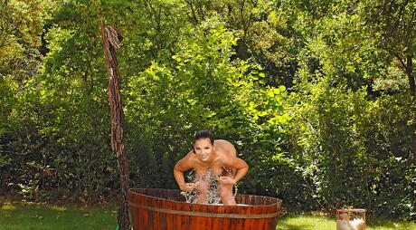 Alluring american brunette milf Eve Angel shows big tits and sexy butt outdoor