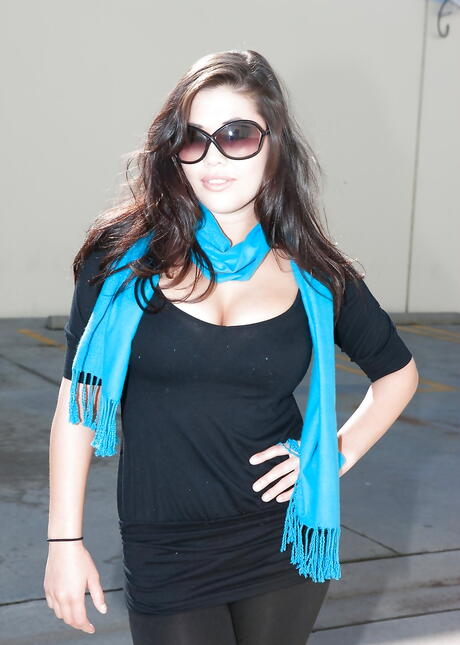 Seductive japanese bombshell London Keyes exhibiting big knockers and bald pussy outdoor