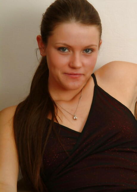 Gracile dark-haired youthful Magda unveils small tits and spreads her legs 