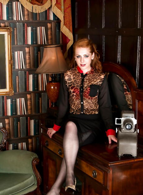 Slim british redheaded mature Tia Jones unveiling small tits and hairy twat 