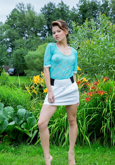 Excellent teen Walda baring big boobs and pussy outdoor