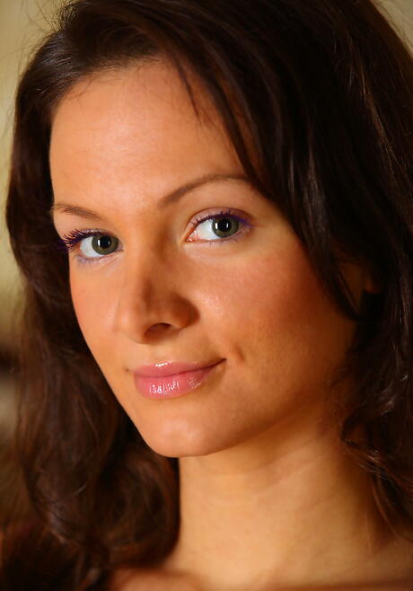 Stunning brunette teen Zhanet A exhibiting big boobies and sexy ass 