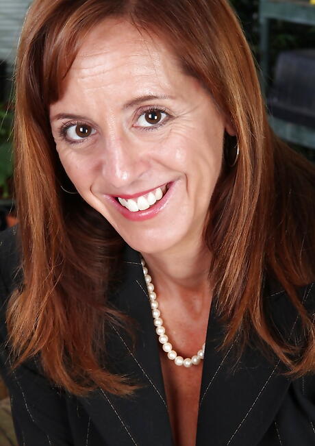 Deluxe british mature Karen Jones in sexy undies exhibiting big boobies and hairy pussy 